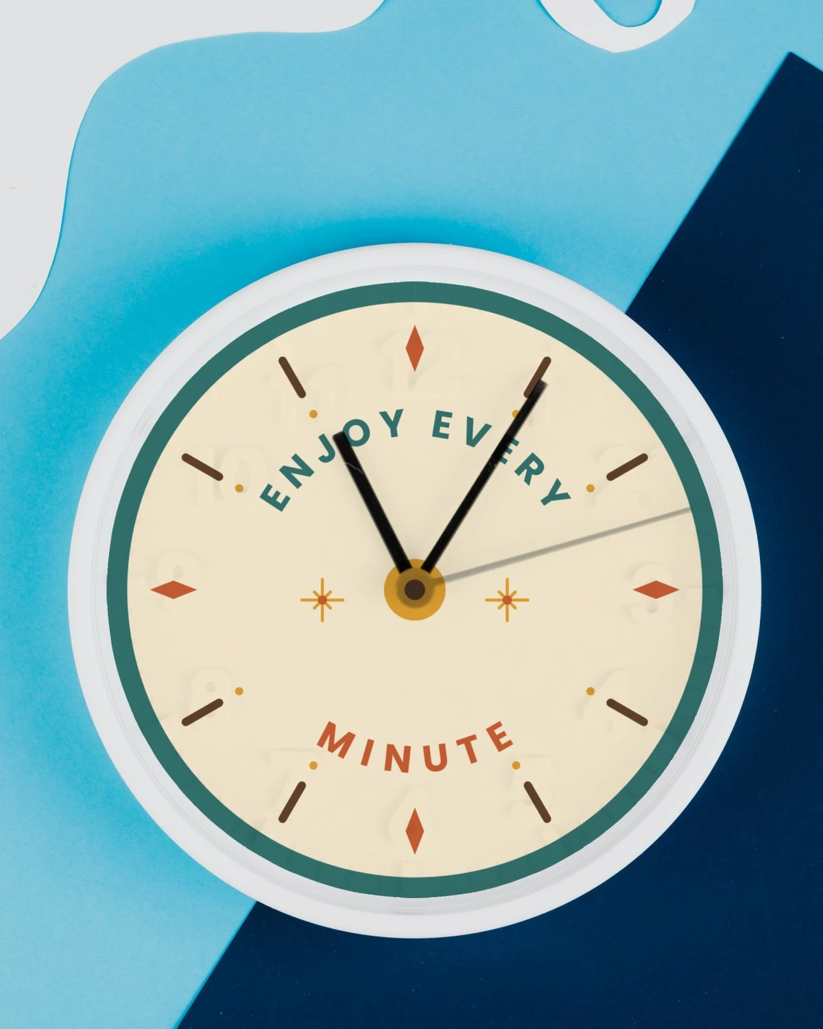 Clock with the "Enjoy every minute." design