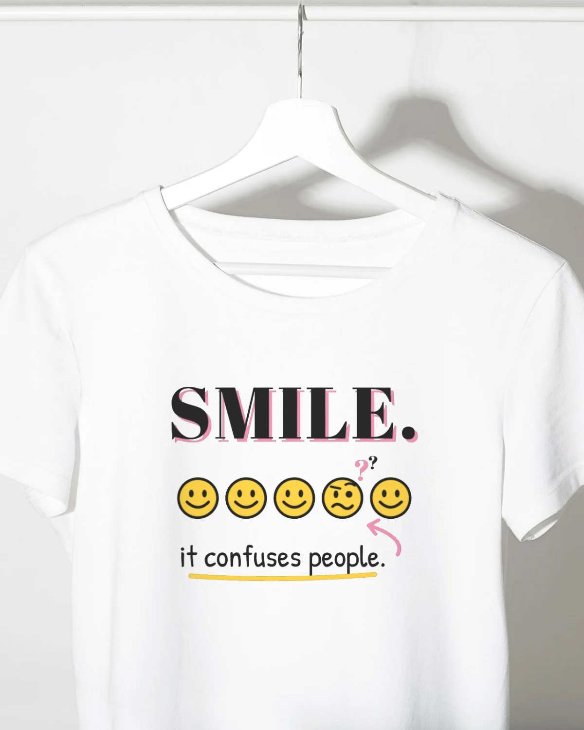 Funny T-Shirt with the "Smile. It confuses people." design