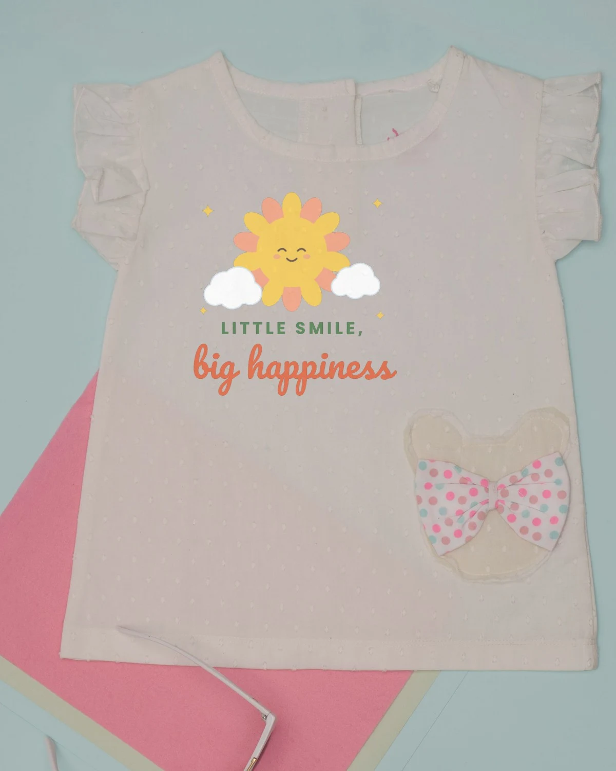 Baby Dress with the "Little smile, big happiness." design