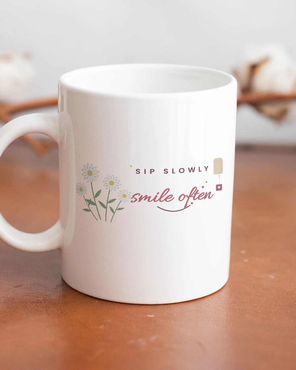 Tea Cup with the "Sip slowly, smile often." design