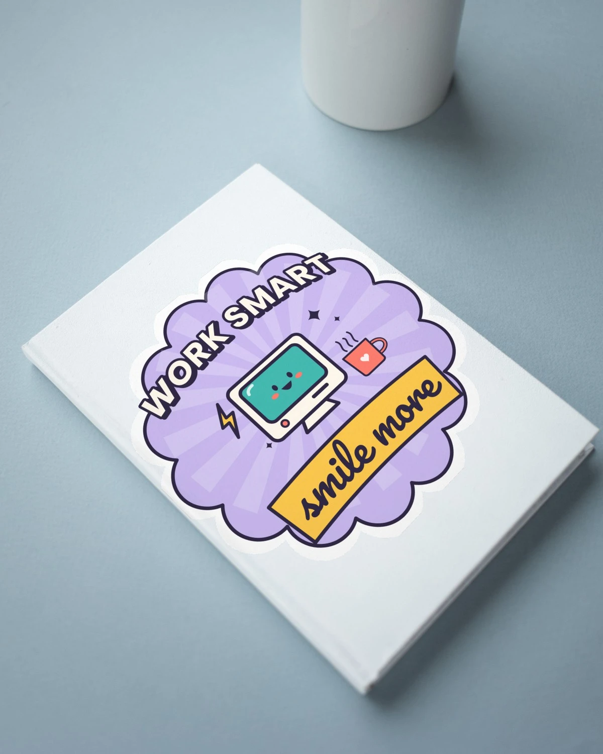 Laptop Sticker with the "Work smart, smile more." design