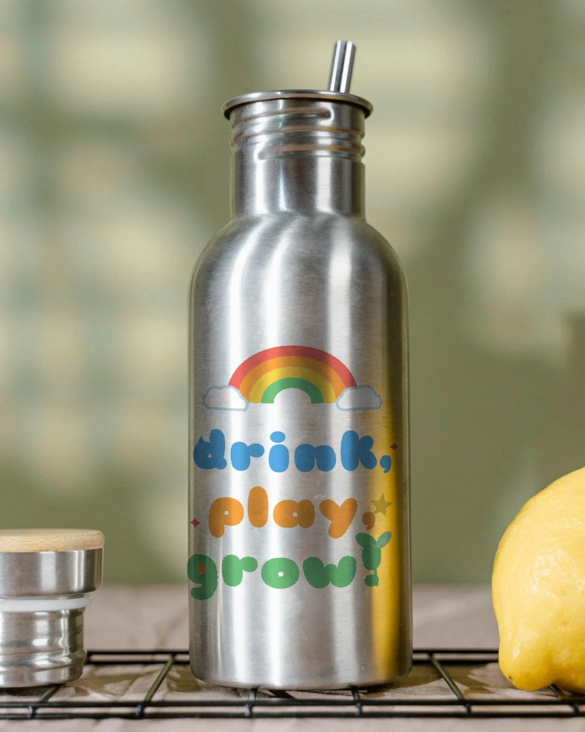 Children's Bottle with the "Drink, play, grow!" design