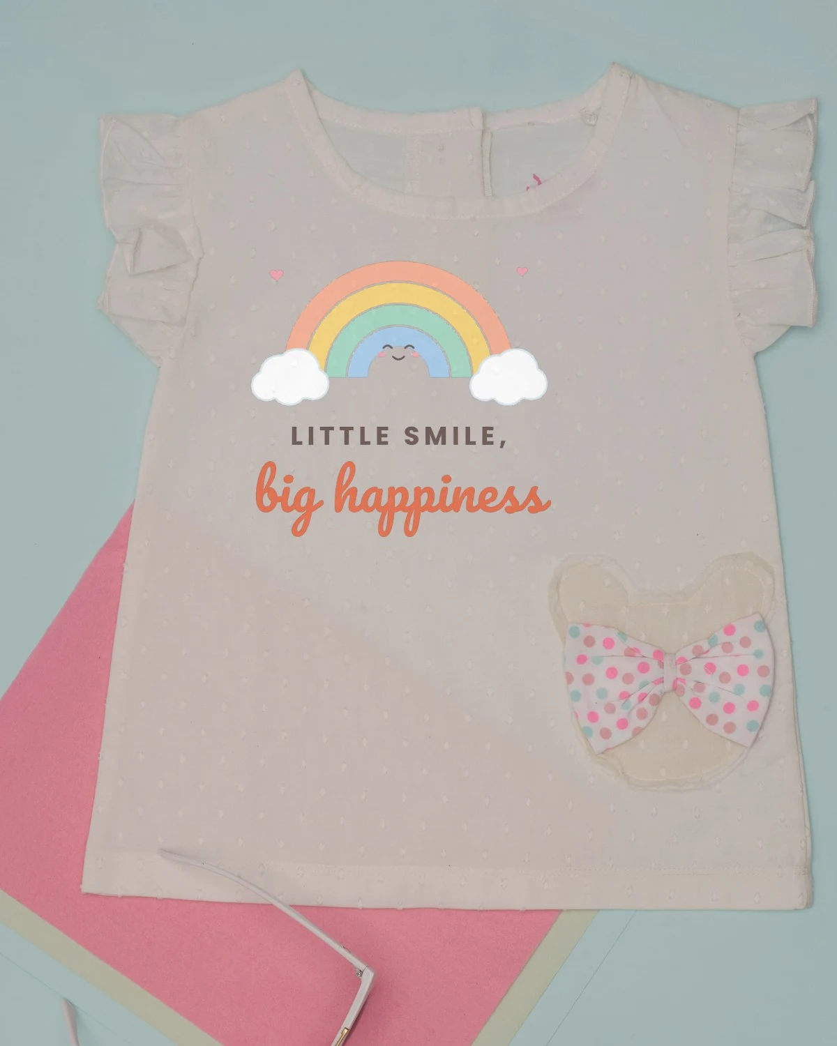 Baby Bib with the "Little smile, big happiness." design