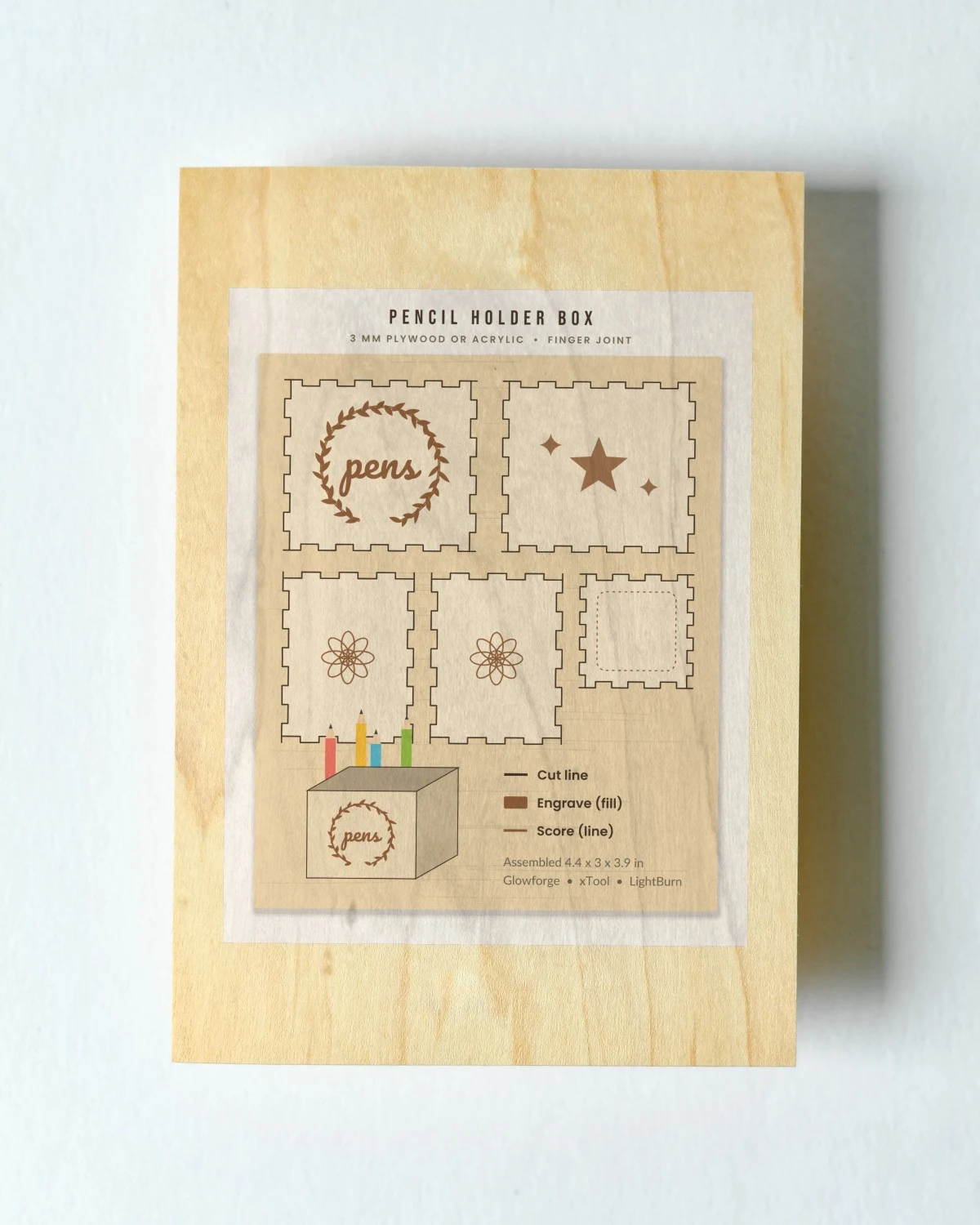 Pencil Holder Box Laser Cut File on a wooden sign
