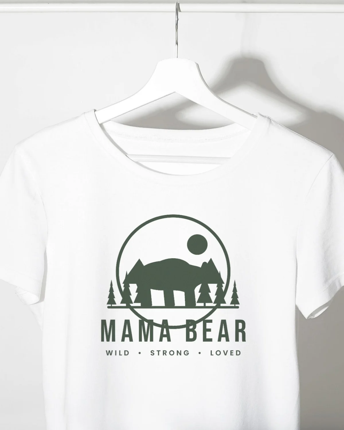 Mama Bear SVG printed on a white t-shirt