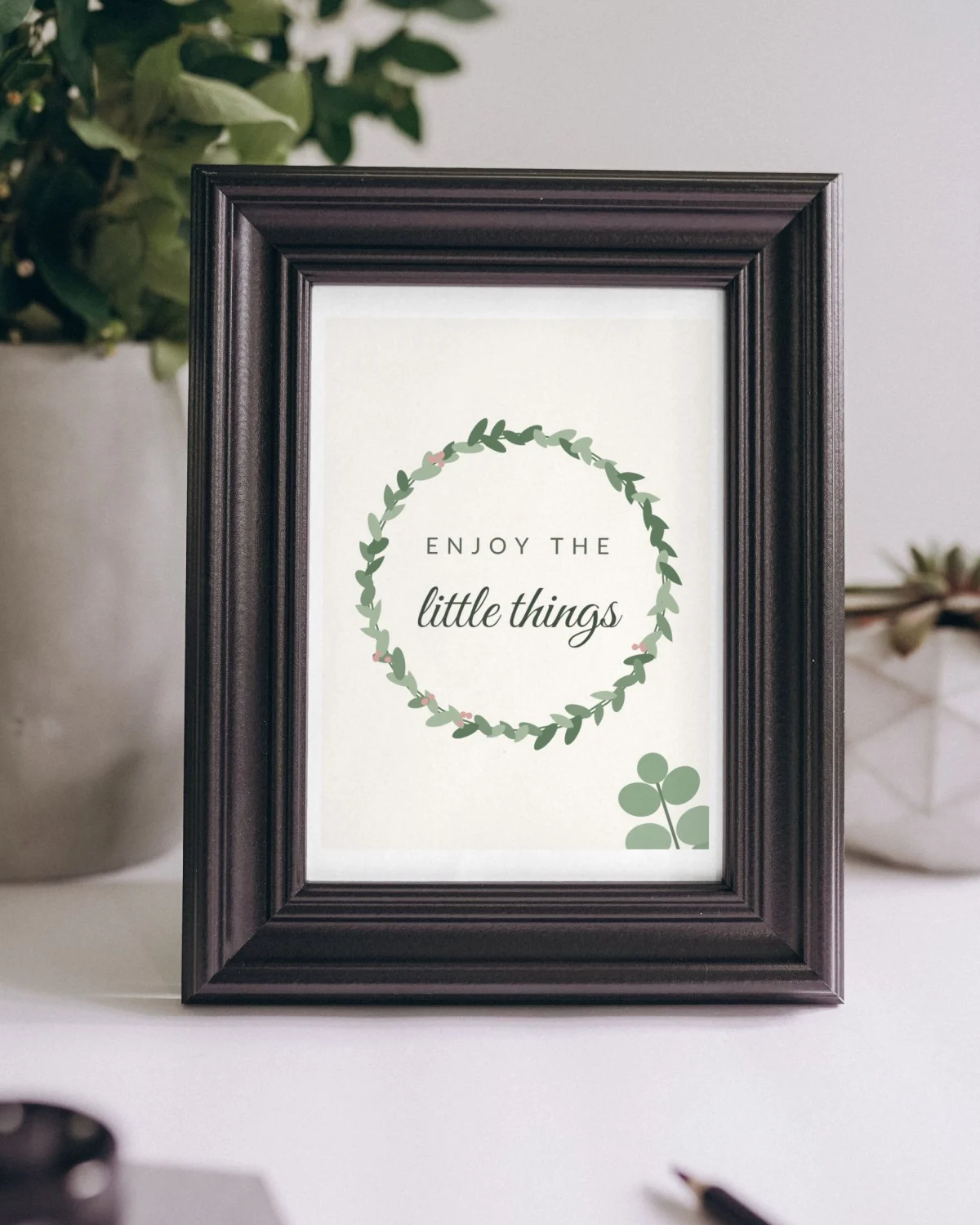Enjoy the Little Things Print framed on a shelf