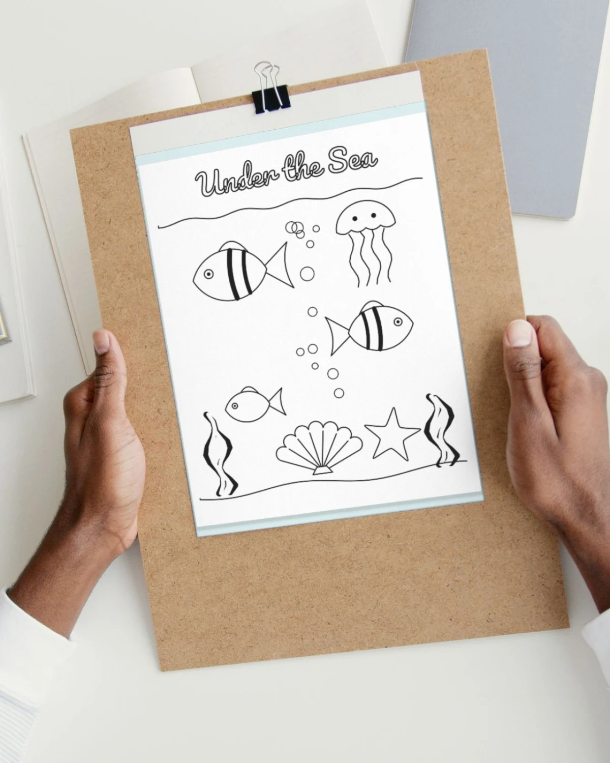 Under the Sea Coloring Page for Kids printed on paper