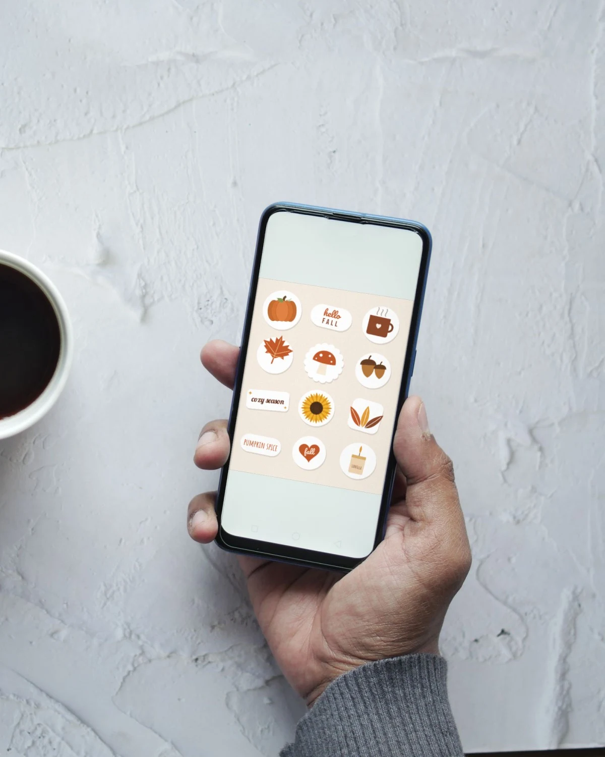 Cozy Fall Digital Stickers on a phone screen