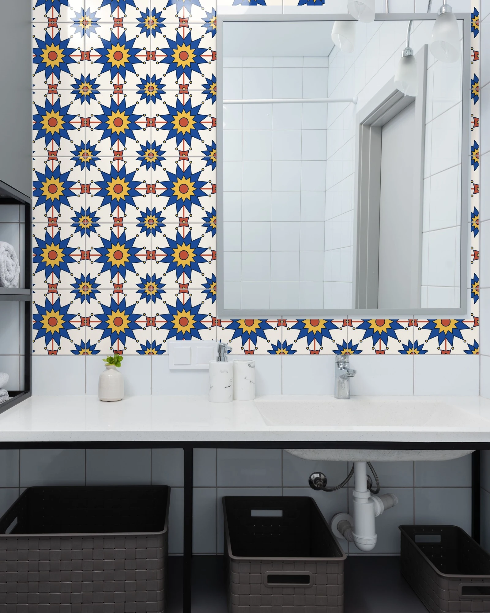 Moroccan Zellige Star Cobalt and Terracotta tiles as a bathroom backsplash above a vanity