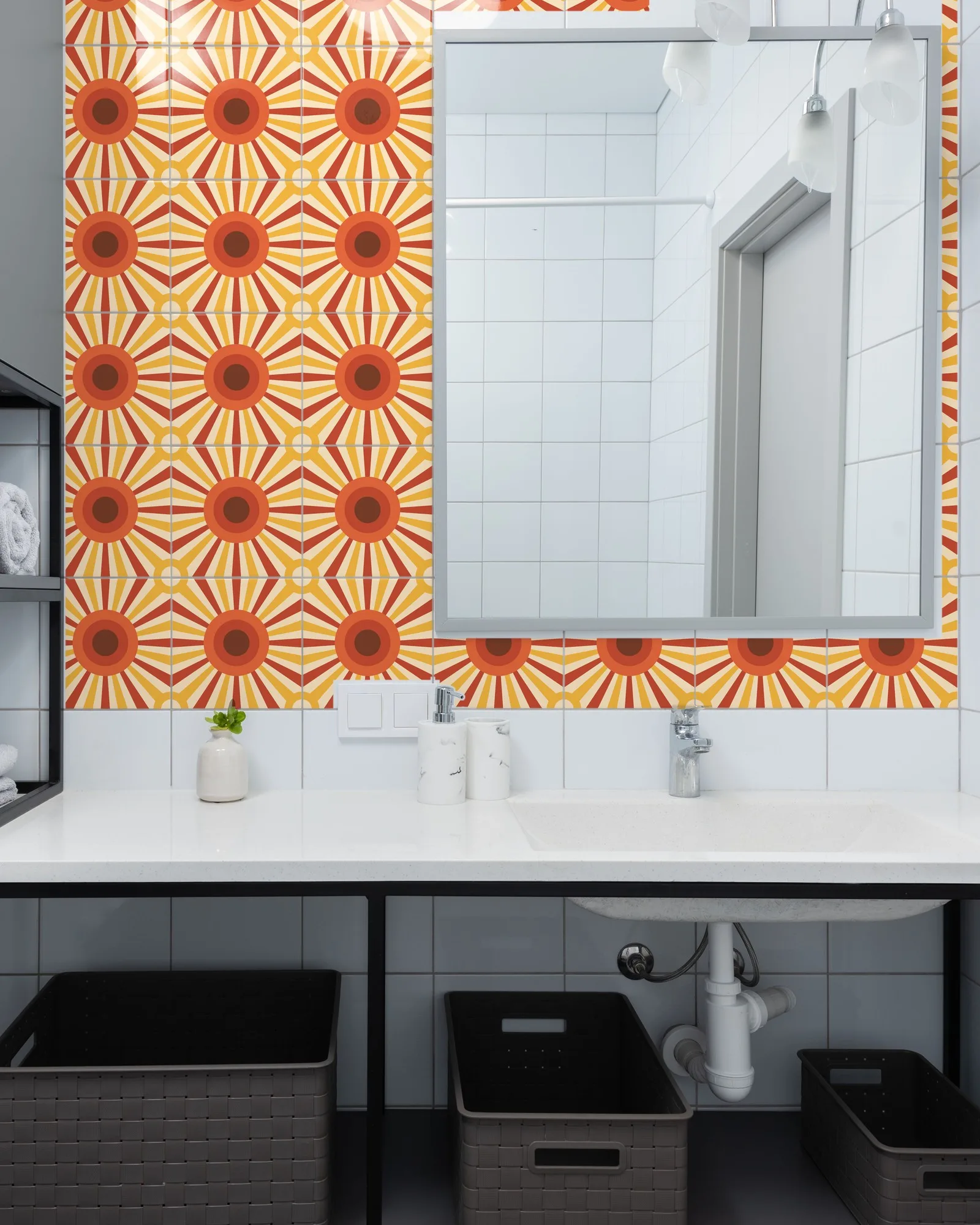 Groovy Sunburst tiles as a bathroom backsplash above a vanity