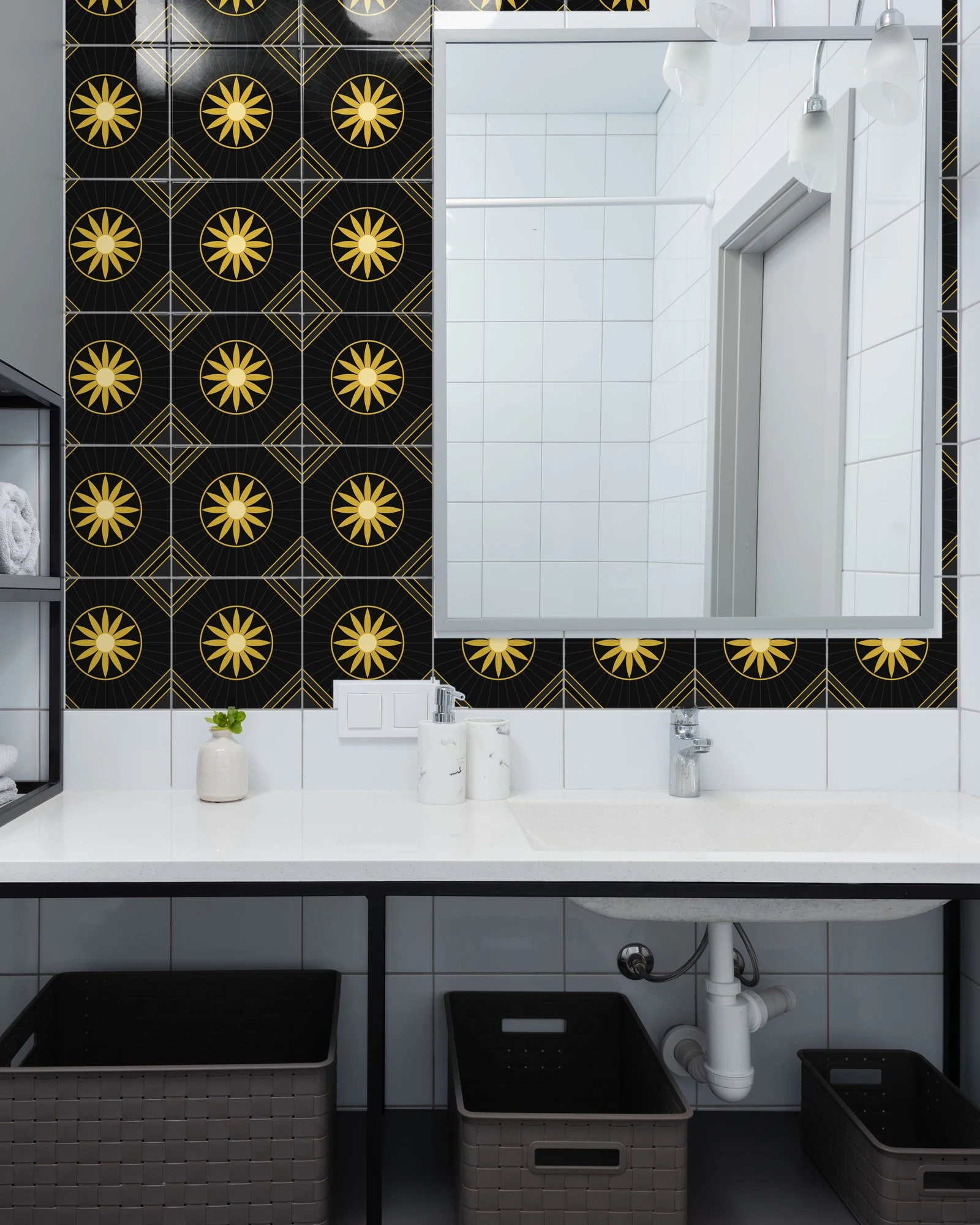 Art Deco Black and Gold Sunburst tiles as a bathroom backsplash above a vanity