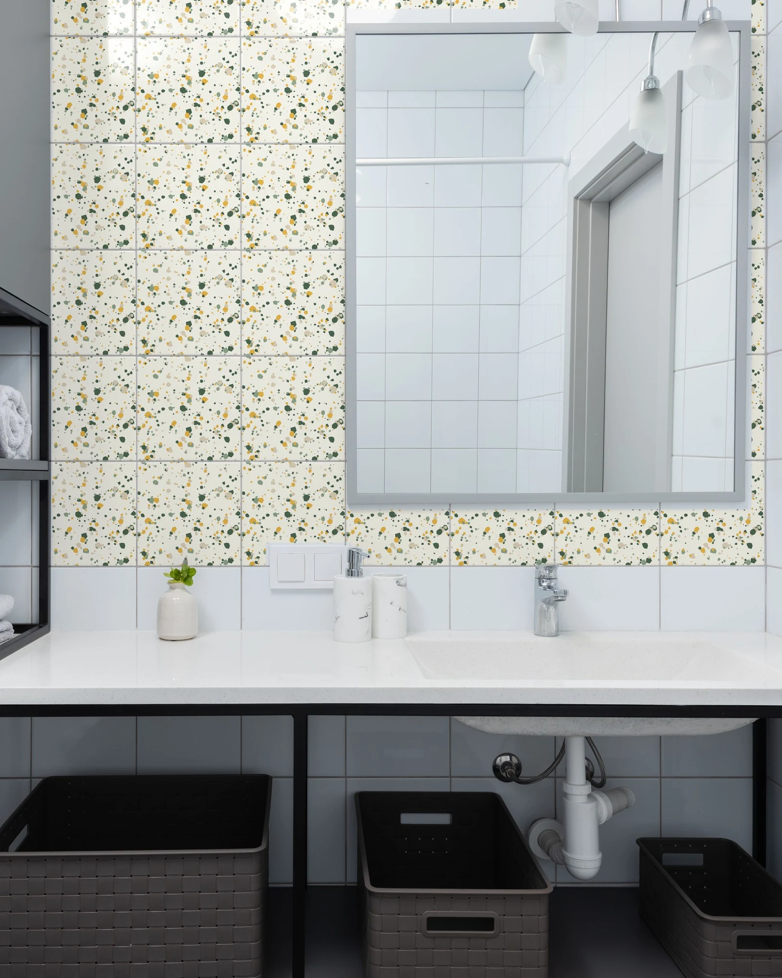 Terrazzo Sage and Mustard tiles as a bathroom backsplash above a vanity