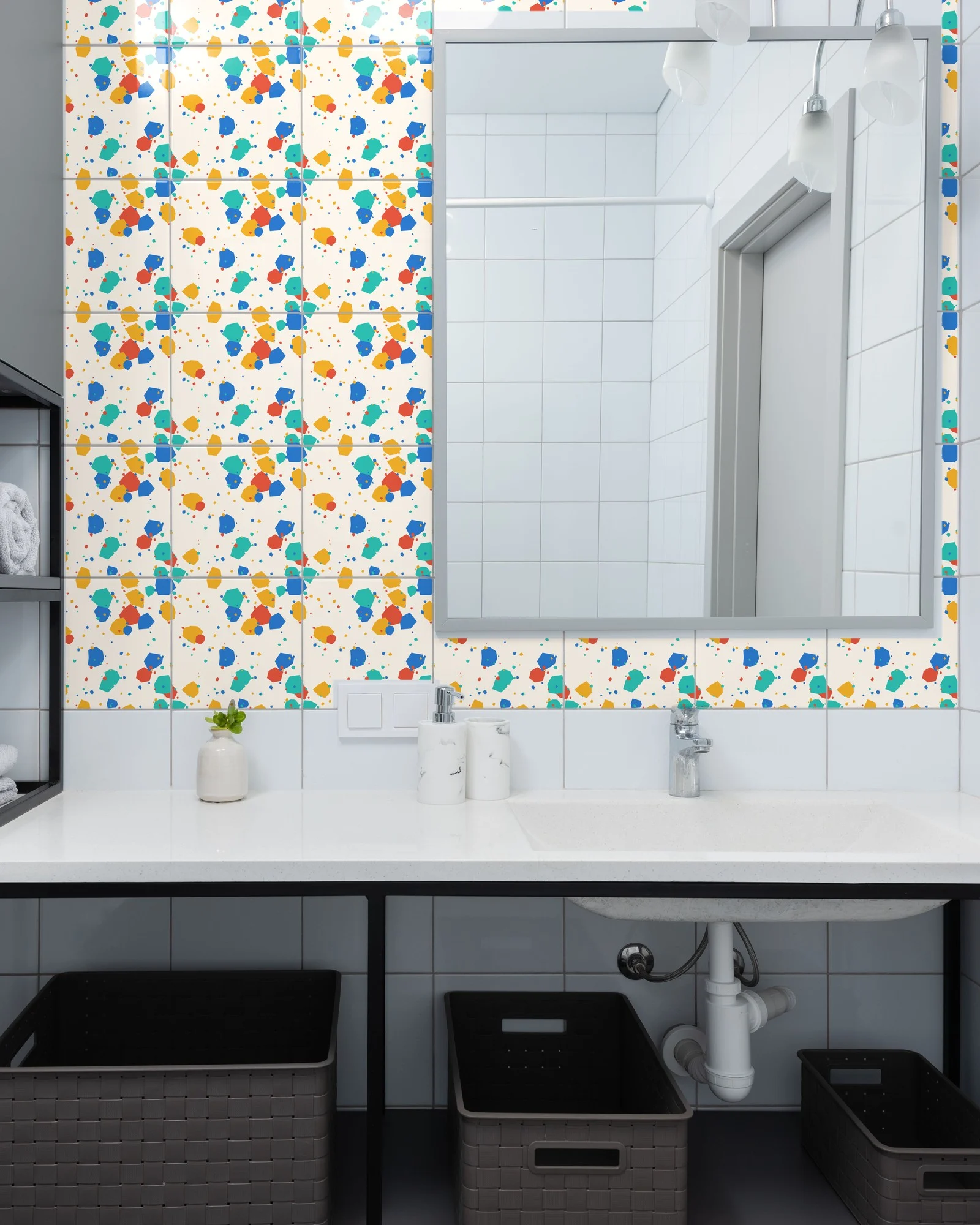 Terrazzo Bold Confetti tiles as a bathroom backsplash above a vanity