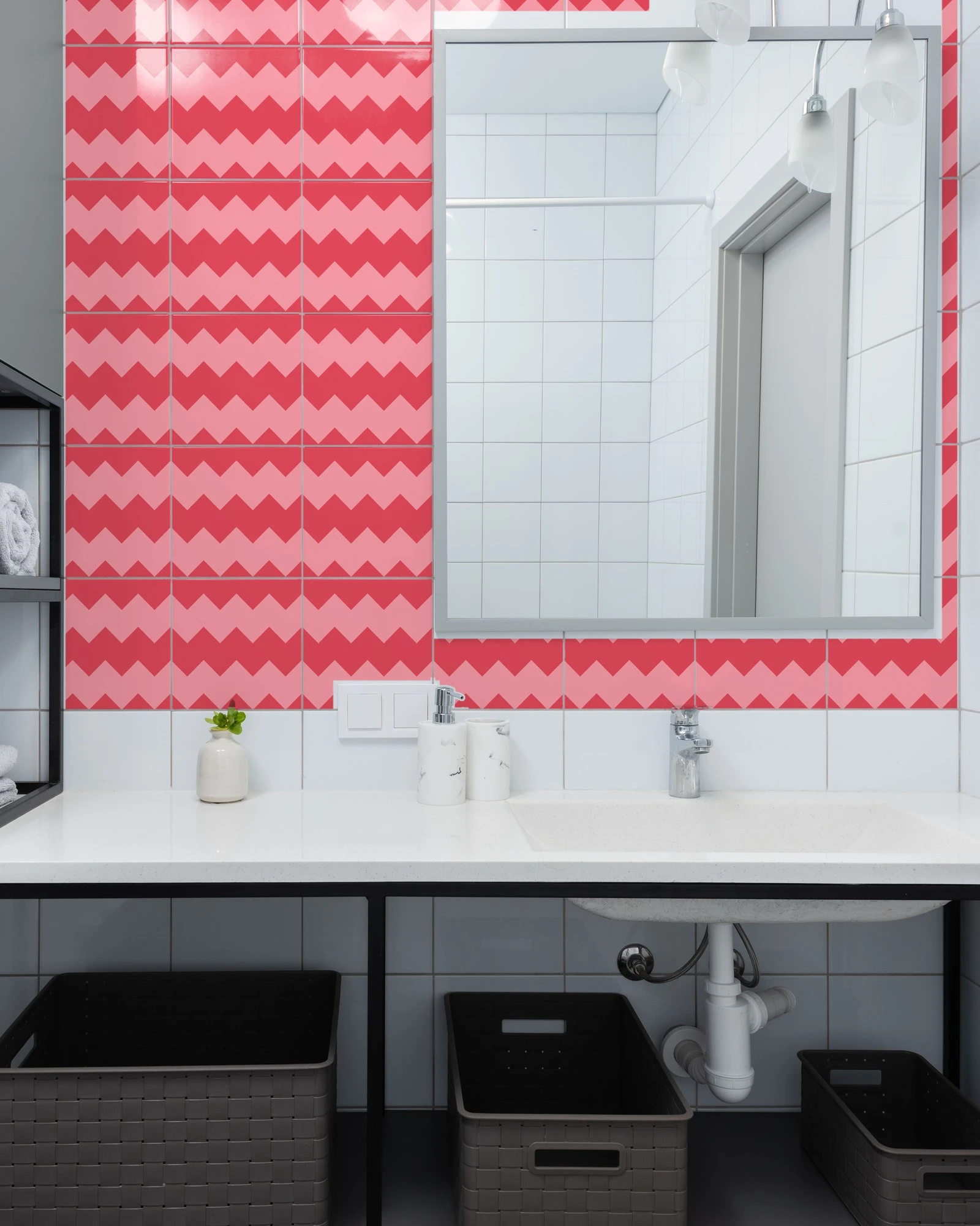 Harlequin Pink and Red tiles as a bathroom backsplash above a vanity