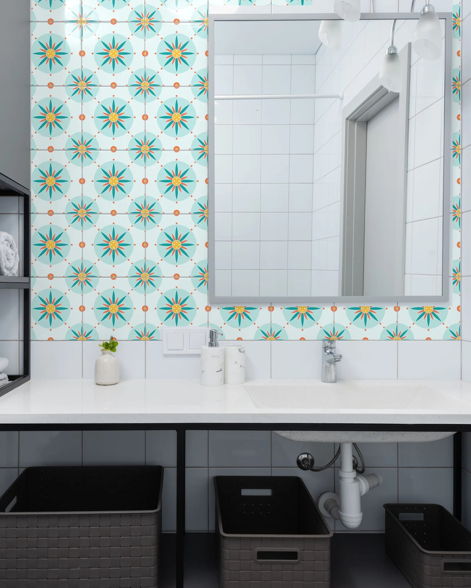 Boho Mandala Turquoise and Coral tiles as a bathroom backsplash above a vanity